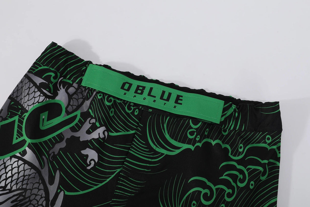 Pantalones cortos de MMA para hombre con impresión por sublimación de logotipo personalizado en verde y negro de alta calidad y marca privada 