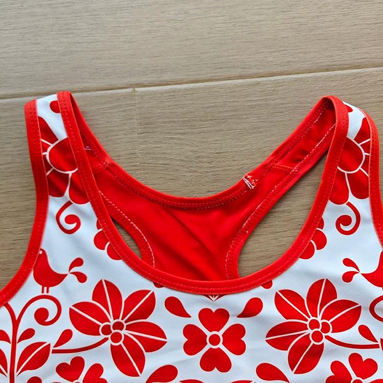 Heißer Verkauf individueller Blumenmuster-Sublimations-Volldruck gefärbter Stoff Racerback-Yoga-Sport-BH mit Gummiband für Frauen 