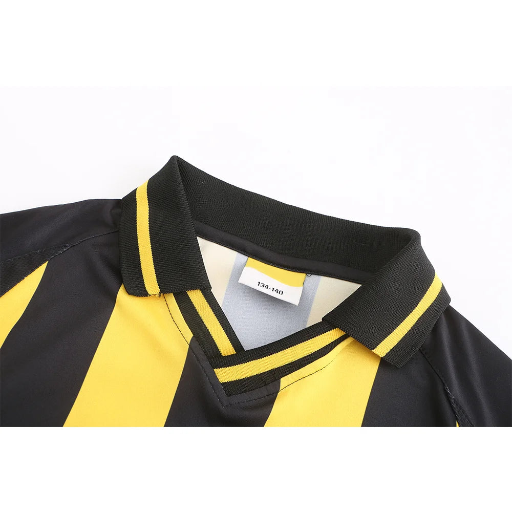 Camisetas de fútbol de manga larga con diseño profesional de equipo con estampado de rayas amarillas y negras 