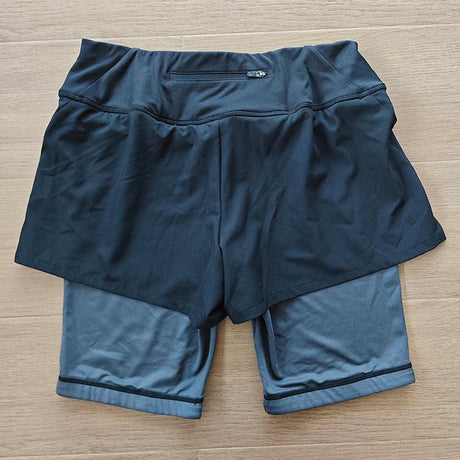 Weltweit beliebte, hochwertige, individuell sublimierte 2-in-1-Trainingsshorts mit Reißverschlusstaschen und reinfarbigem Aufdruck für Männer und Frauen 