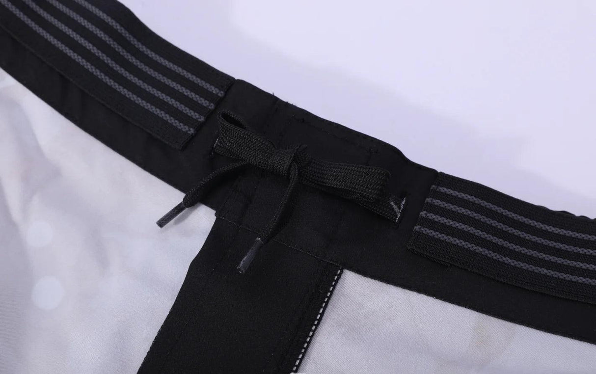 Fabricantes de fábrica Pantalones cortos de MMA con función transpirable Ropa de artes marciales Pantalones cortos de boxeo Ropa de lucha de MMA 