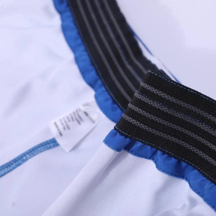 Pantalones cortos de mma de la mejor calidad de Dblue al por mayor para hombres y mujeres. Diseñe sus propios pantalones cortos de mma con telas de mezcla de poliéster 